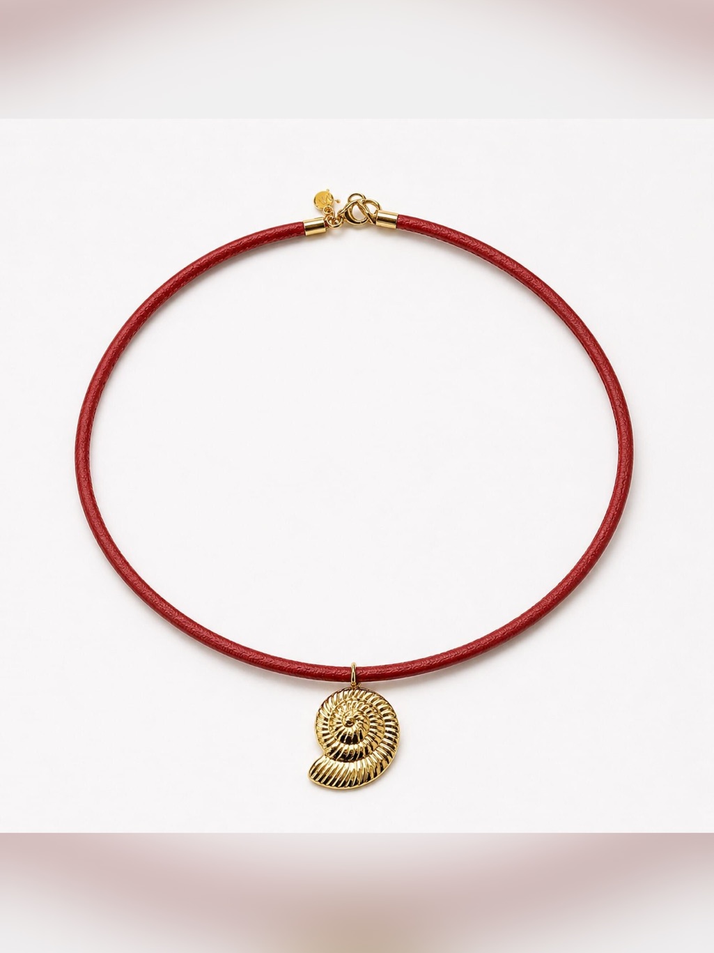 Gold Shell Pendant On Red Leather Choker
